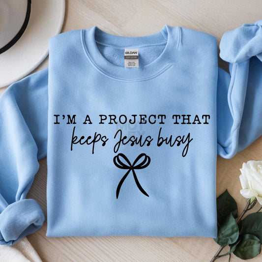 I'm a Project That Keeps Jesus Busy Graphic Tee
