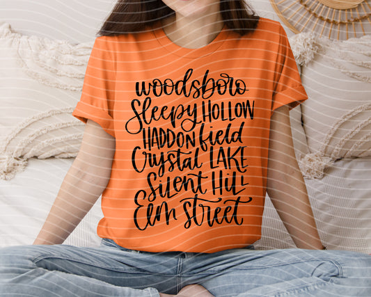 Woodsboro Sleepy Hollow Horror Towns Graphic Tee