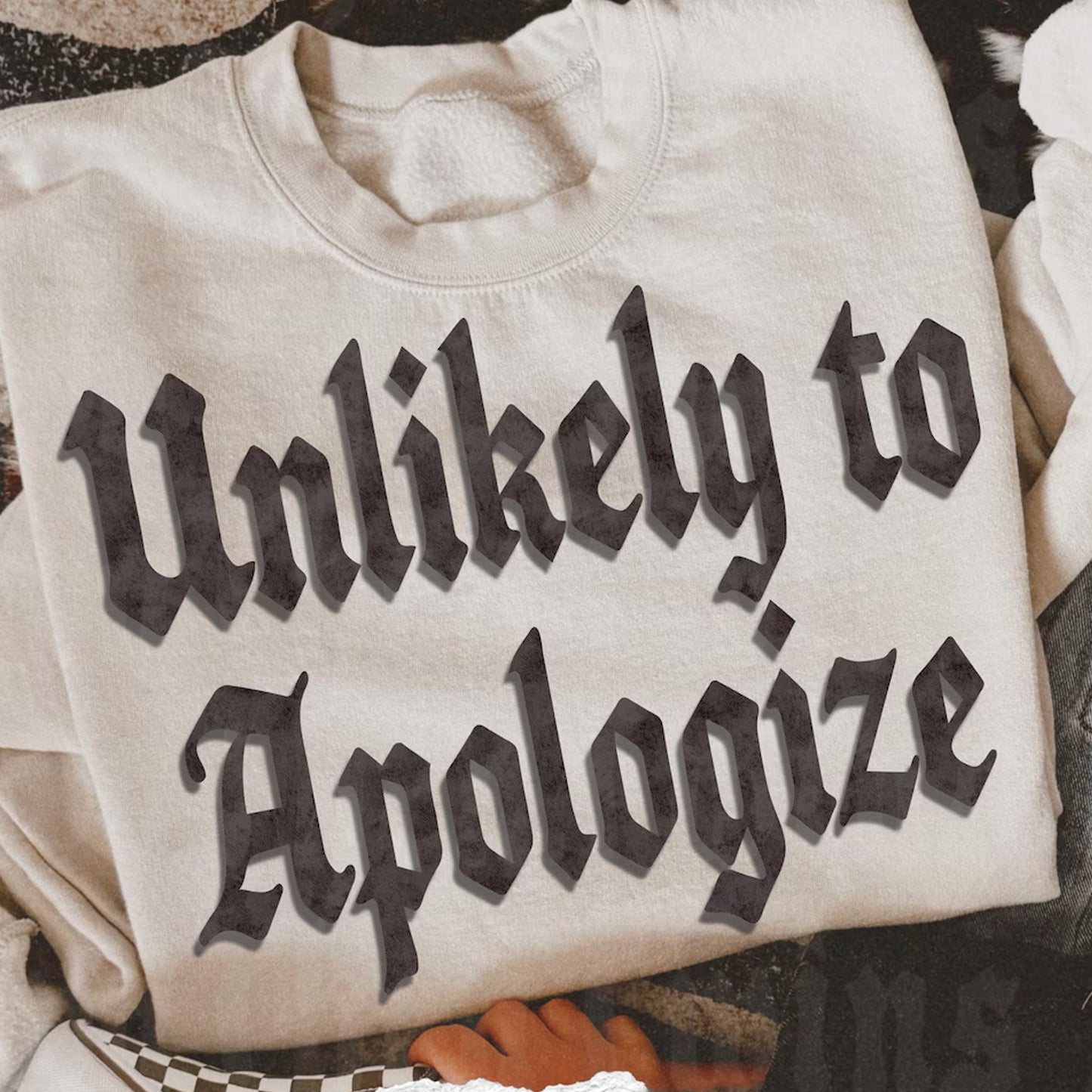 Unlikely to Apologize Graphic Tee