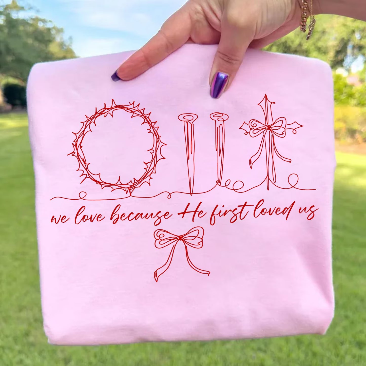 We Love Because He First Loved Us Graphic Tee