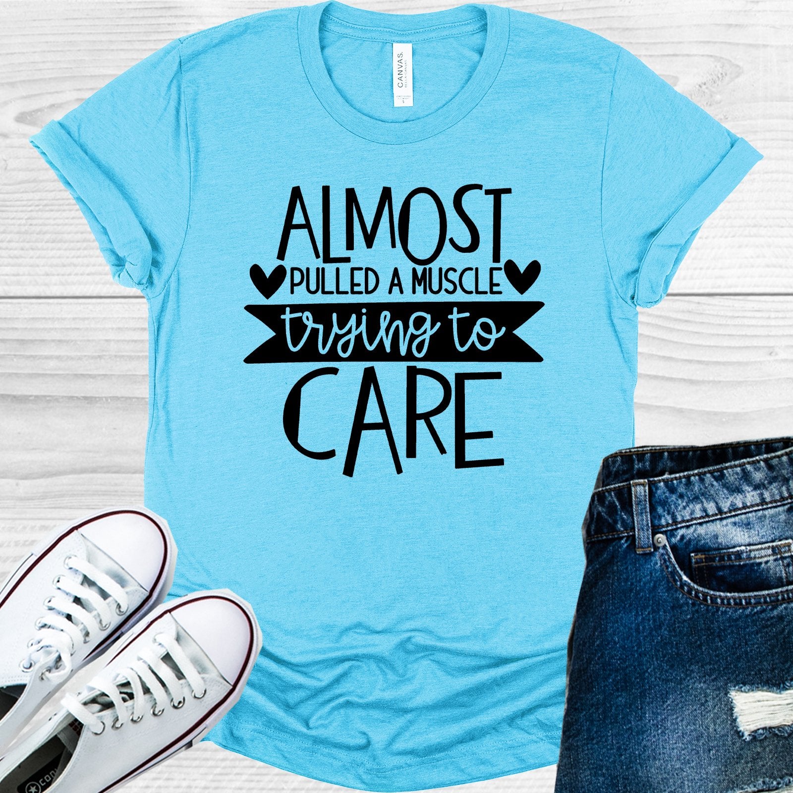 Almost Pulled A Muscle Trying To Care Graphic Tee Graphic Tee