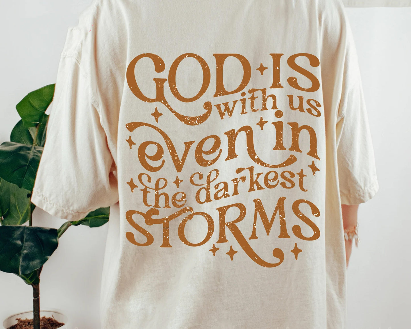 God is With Us Even in the Darkest Storms Graphic Tee