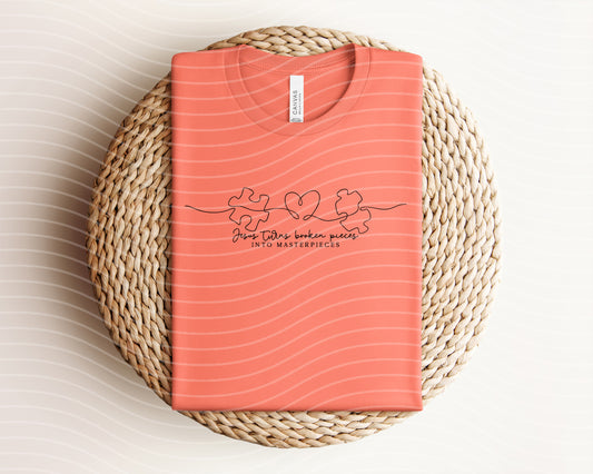 Jesus Turns Broken Pieces into Masterpieces Graphic Tee