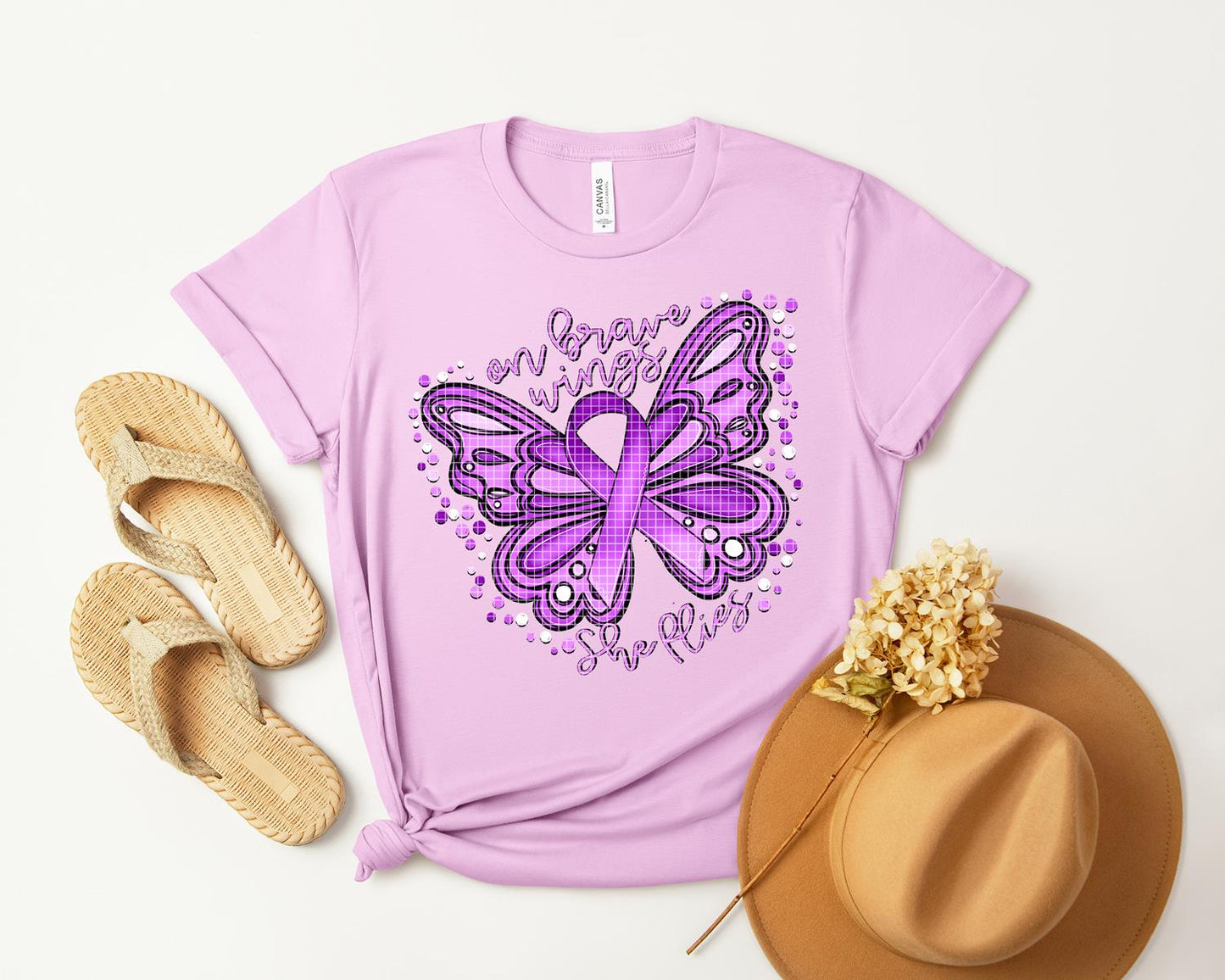 On Brave Wings She Flies Graphic Tee