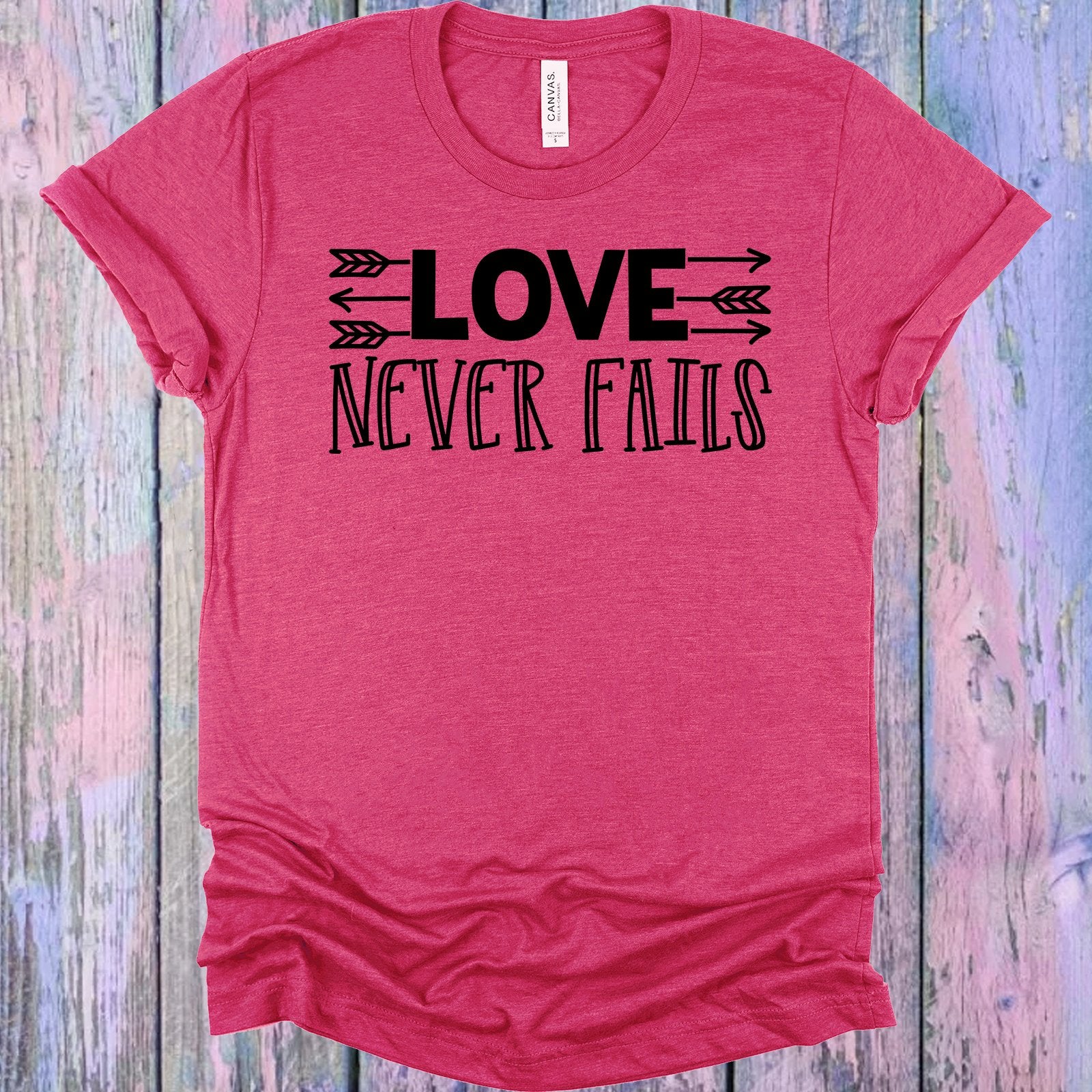 Love Never Fails Graphic Tee Graphic Tee