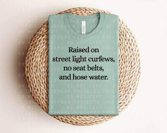 Raised on Street Light Curfews, No Seat Belts, and Hose Water Graphic Tee