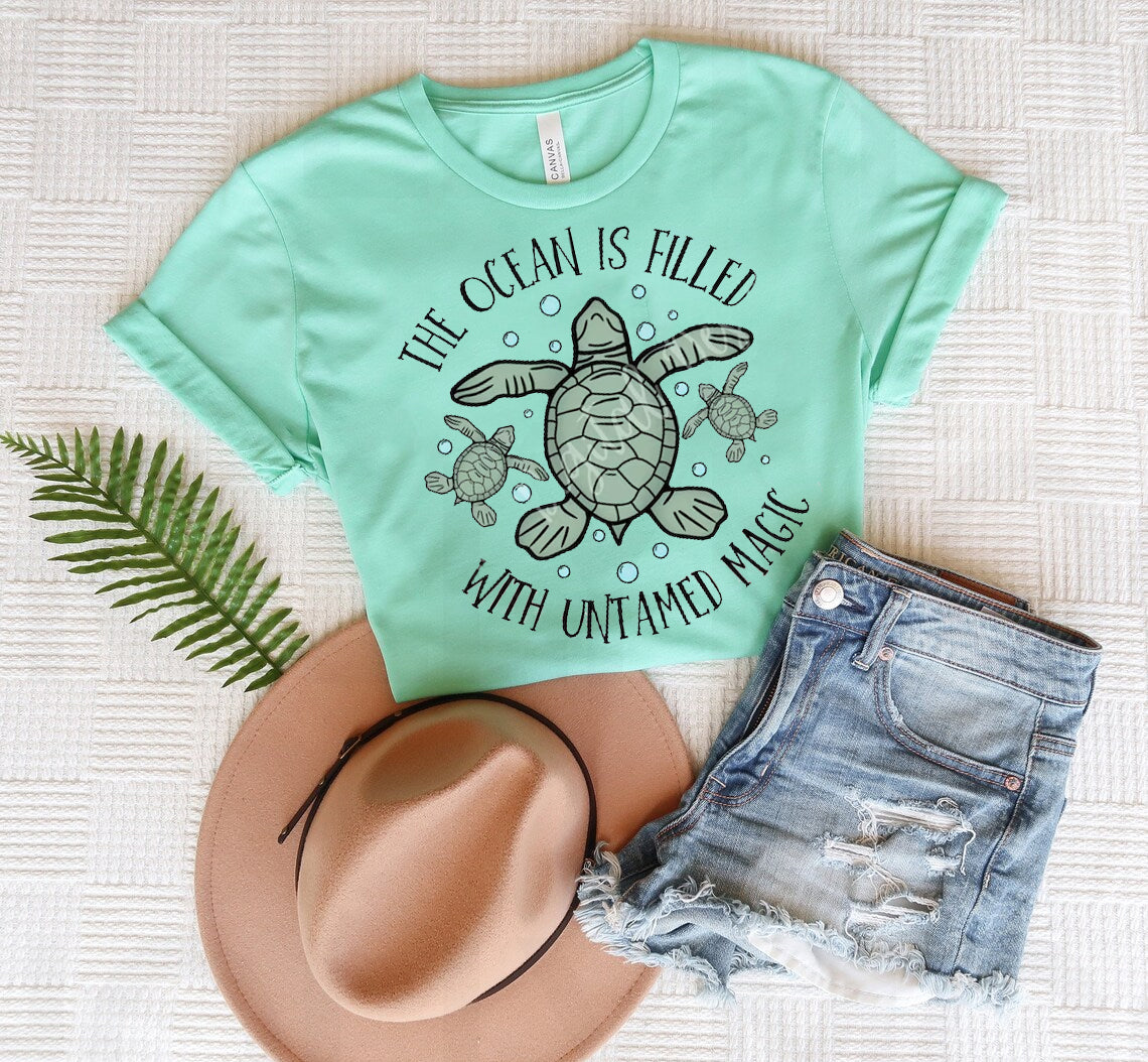 The Ocean is Filled with Untamed Magic Graphic Tee