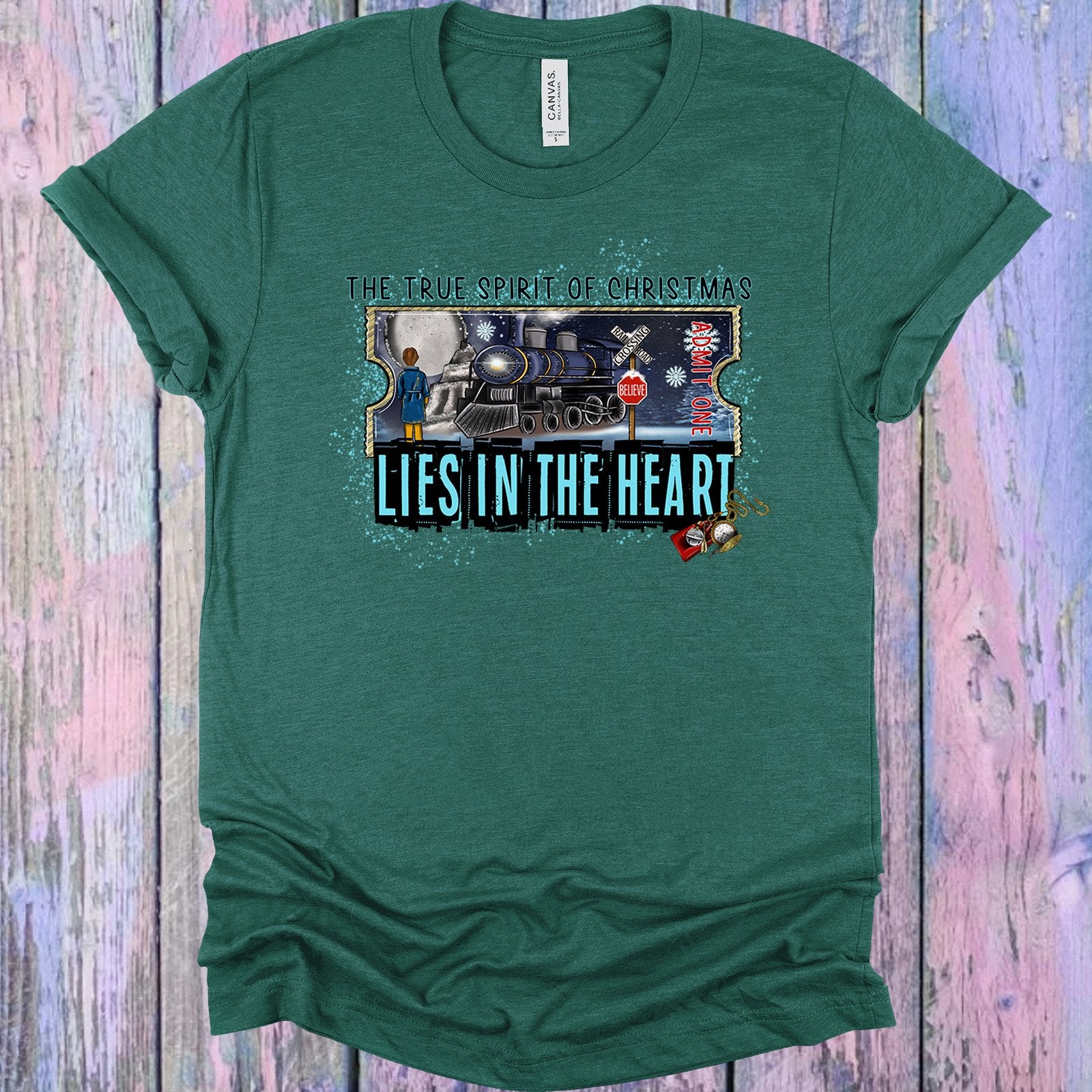 The True Spirit Of Christmas Lies In The Heart Graphic Tee Graphic Tee