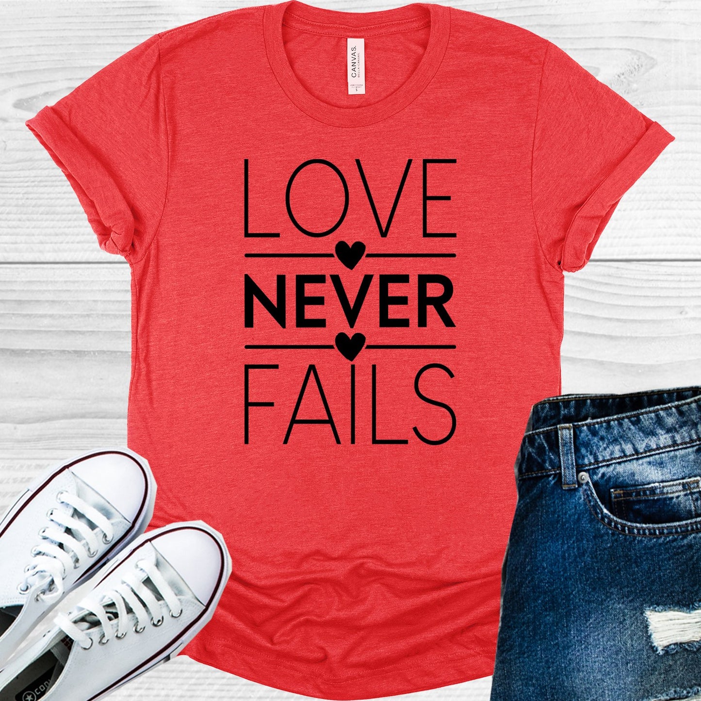 Love Never Fails Graphic Tee Graphic Tee