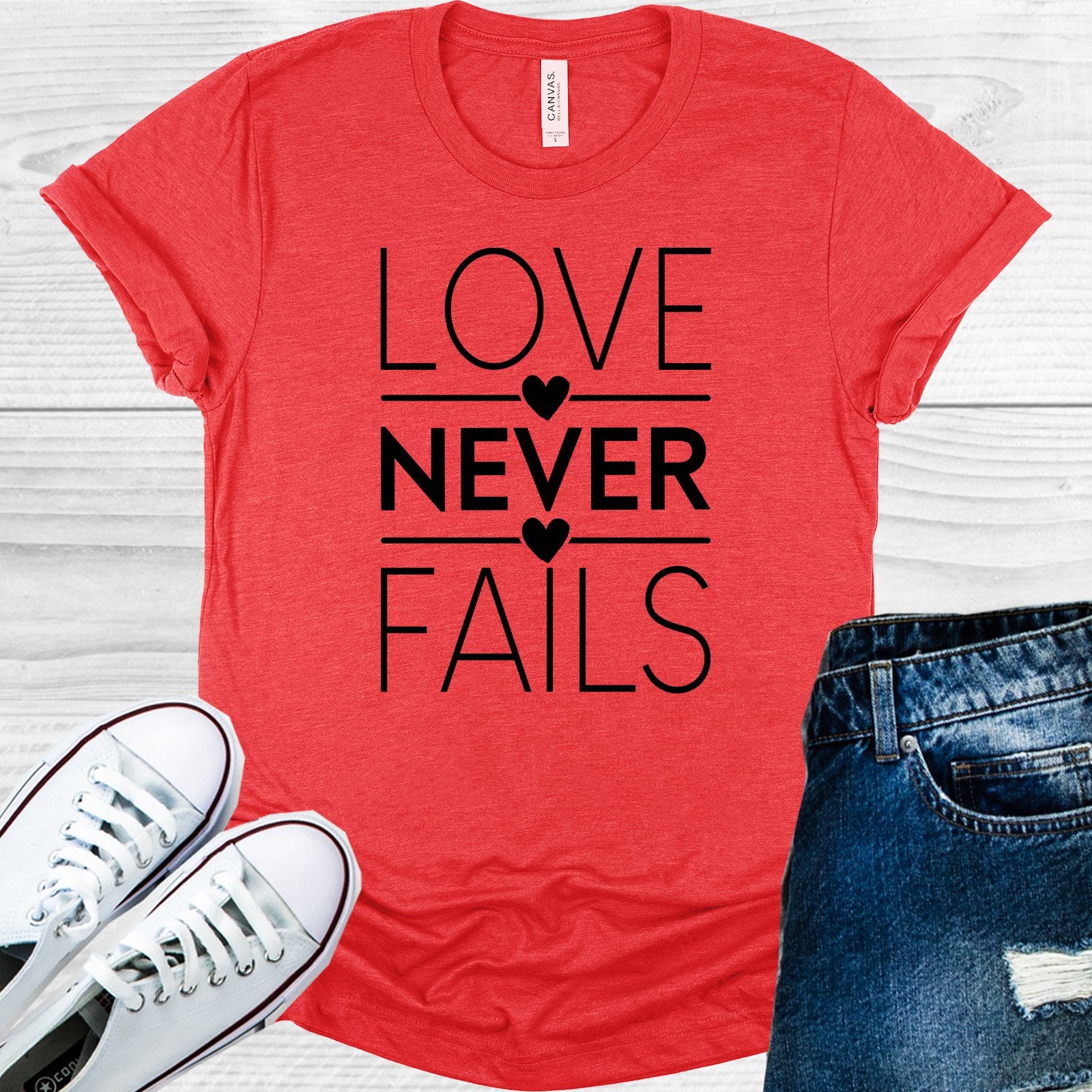 Love Never Fails Graphic Tee Graphic Tee